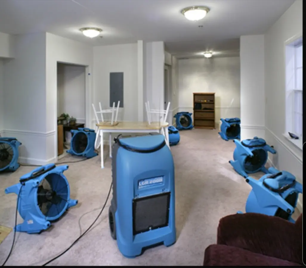 Air movers and dehumidifier setup for Water Damage Restoration in Forestdale